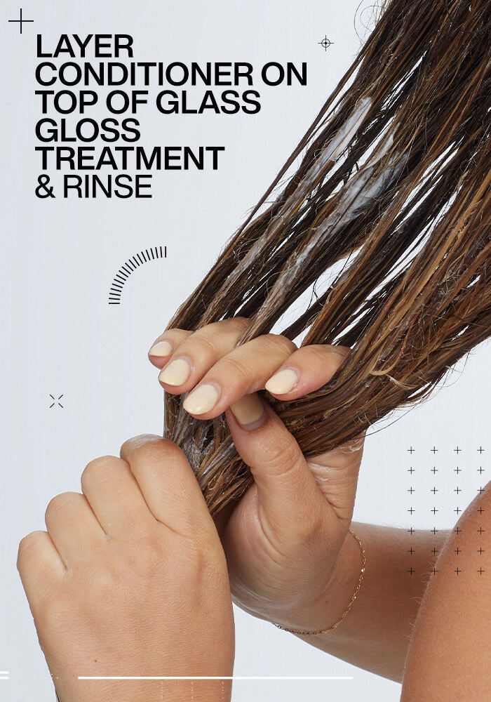 Redken Acidic Color Gloss Conditioner image of model applying conditioner