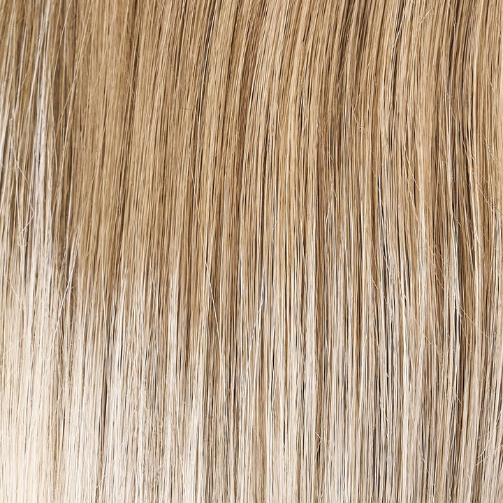 S18-60/102RO (Solstice) | Cool dark roots gradually lighten to platinum blonde.