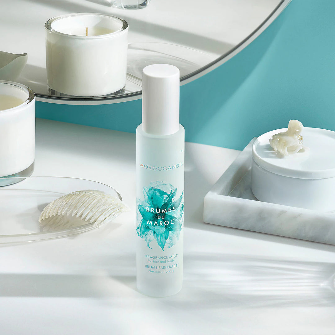 Moroccanoil Hair and Body Fragrance Mist image of bottle on table