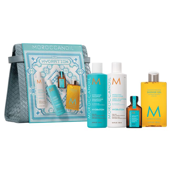 Moroccanoil product set including bottles and a pouch on a white background