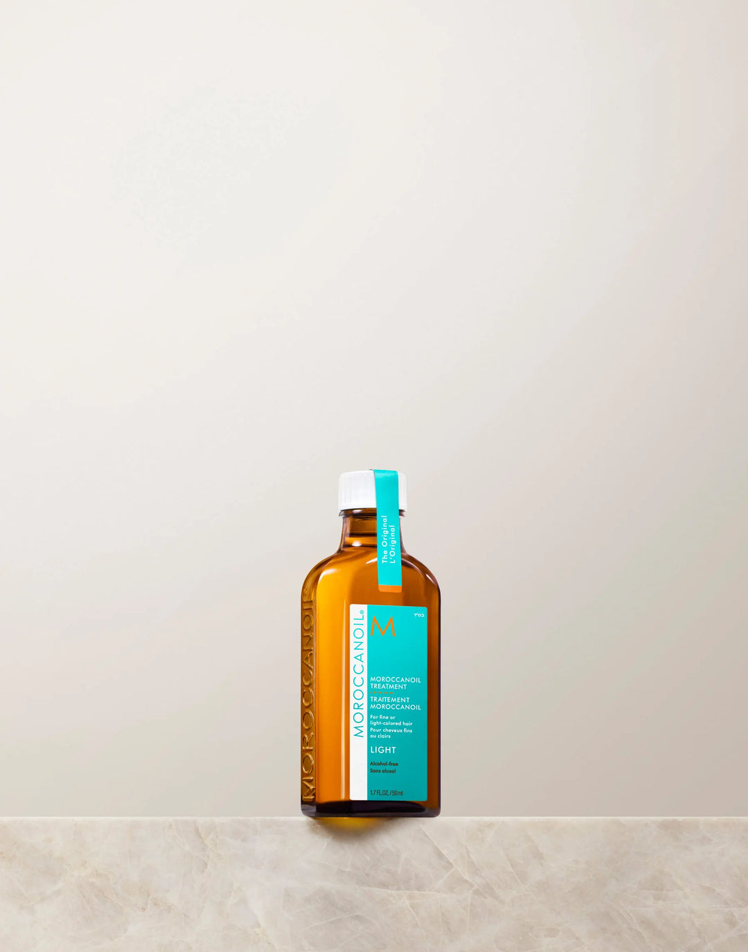 Moroccanoil Moroccanoil Treatment Hair Oil Light image of bottle on shelf