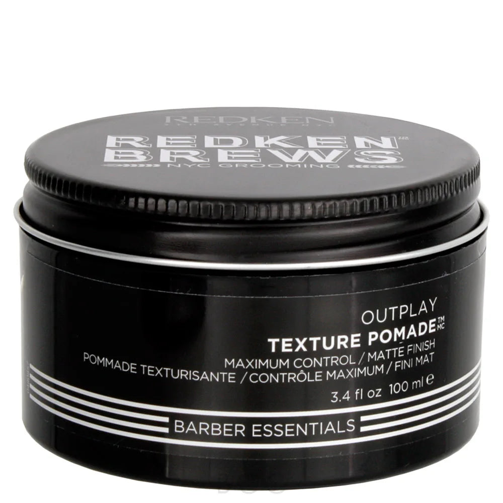 Black jar of Redken Brews Outplay Texture Pomade on a white background