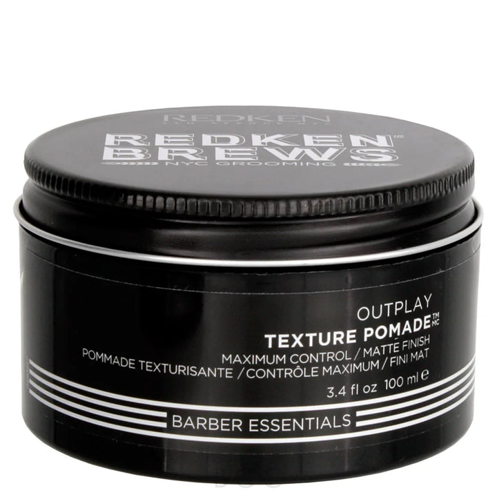 Black jar of Redken Brews Outplay Texture Pomade on a white background