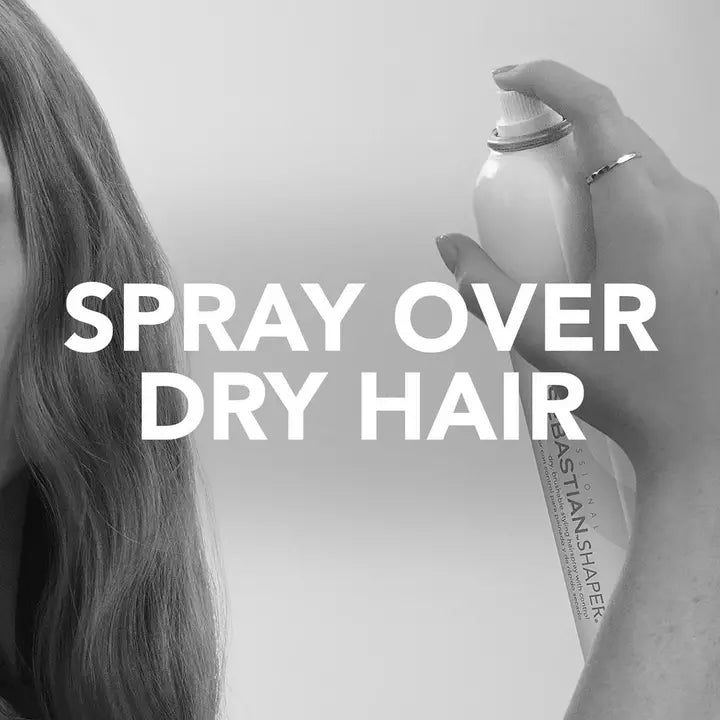 Sebastian Shaper Hairspray image of model spraying over hair
